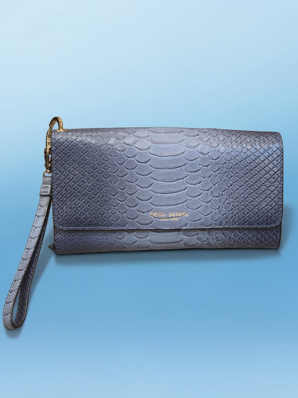 Henry Bendel wristlet!  Excellent condition.  My phone too big for the holder !